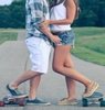 Boy and girl on skateboards avatar